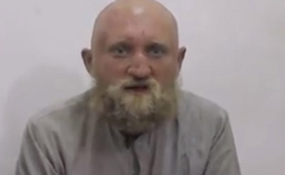 Один из российских пленников убит «ИГ»  (фото и видео)