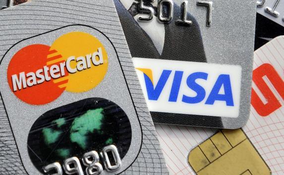 Visa и MasterCard перестали принимать оплату через терминалы в Крыму