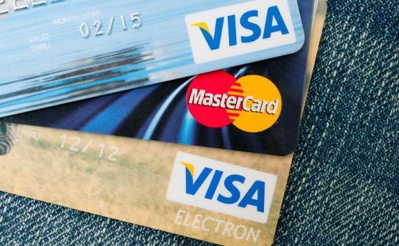 СМИ: Генбанк рискует, объявляя о приёме карт Visa и MasterCard в Крыму