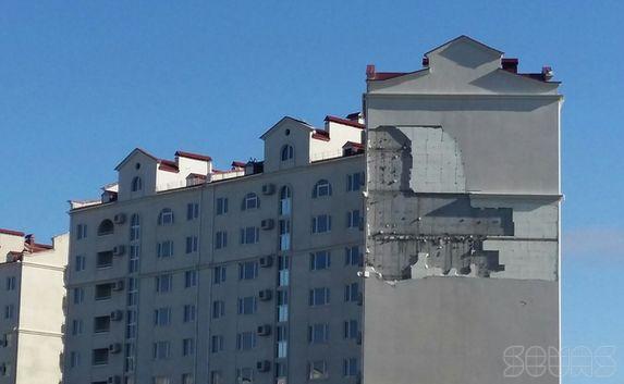 Штукатурка с общежития института банковского дела исчезла. Фотофакт