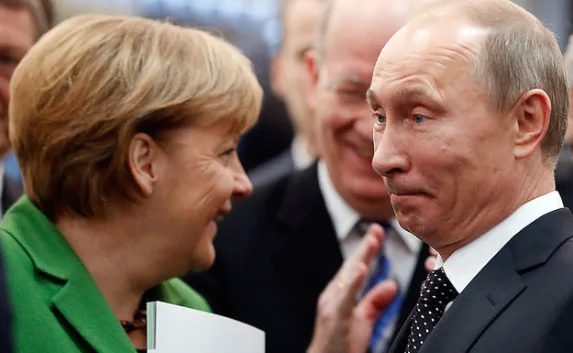 Путин и Меркель на встрече обсудили ситуацию в Украине