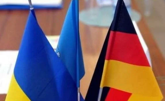 Беженцев в Украине оденет на зиму Германия