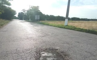 Керчане сами латают дороги — фотофакт
